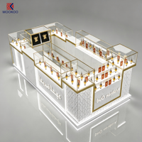 Kiosque de parfum Oud Arabe personnalisé, texture marbre, présentoir en verre avec finition dorée et logo de marque pour centre commercial