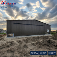 Bâtiment d'entrepôt préfabriqué en structure métallique, hangar industriel, atelier, charpente métallique