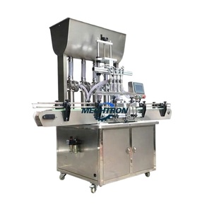 Machine de remplissage de bouteilles de liquide électrique commerciale pour usine, avec quatre buses, remplissage automatique de liquide pour une production élevée - Product Image 2