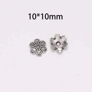 Cuentas espaciadoras de flor de seis pétalos en plata antigua para la fabricación de collares, paquete de 50 piezas. - Product Image 2