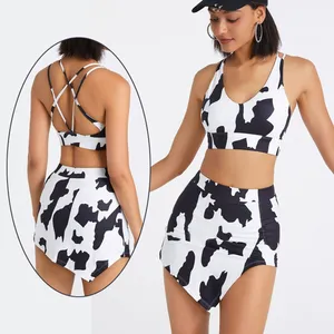 Großhandel Riemchen BH und unregelmäßige untere Rock-Sets Cool Dry Cow Printed Frauen Active Yoga Wear