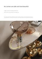 Meuble de design moderne pour la maison, table console avec cadre doré et plateau en marbre, table de forme elliptique, table décorative pour salon