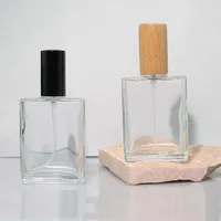Flacon de parfum de luxe carré en verre transparent 30 ml avec pulvérisateur à pompe estampé à chaud pour voyage, atomiseur rechargeable à brume fine