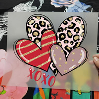 Transferts DTF populaires et tendance : Motif dessin animé Amour XOXO Saint-Valentin, Durables et prêts à l'emploi pour t-shirts