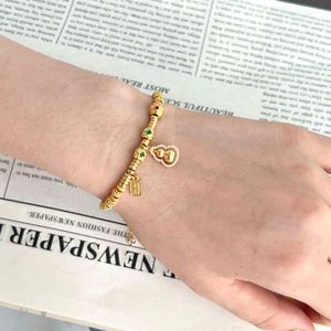 Dylam Diseño Único Pulseras de Joyería con Cadena de Plata S925 Bañada en Oro de 18K, Cuentas y Colgante de Zirconia 5A con Forma de Calabaza y Etiqueta 'Get Rich' - Product Image 2