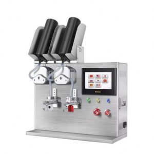 Petite machine de remplissage automatique à double tête pour colle UV, vernis à ongles, mascara, rouge à lèvres et colle à fil, avec dosage quantitatif - Product Image 1