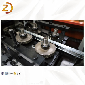 Petit pain de grille de plafond en T et <span class=keywords><strong>croix</strong></span> en T formant la machine principale de quille de plafond en T pour la fabrication de carreaux pour le système de plafond - Product Image 3