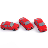 Vente en gros de balles anti-stress en forme de mini-voiture rouge avec logo personnalisé, jouets promotionnels en PU, jouets anti-stress en forme de véhicule