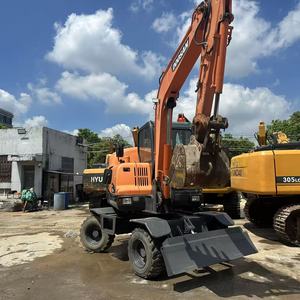 รถขุดตีนตะขาบ Doosan DX60W พร้อมบุ้งกี๋ขนาด 0.18 ลูกบาศก์เมตร น้ำหนักเครื่อง 6,000 กิโลกรัม (ระดับ 6 ตัน) เครื่องยนต์และมอเตอร์ - Product Image 1