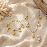Ensemble collier et bracelet en acier inoxydable plaqué or PVD 18 carats, motif océan, pendentif coquillage et étoile de mer, chaîne serpent, hypoallergénique, bijoux de plage