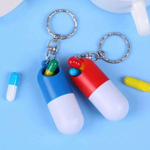 Custom Logo Mini Capsule Shaped Pill <b>Box</b> Keychain Portable Travel Medicine Organizer Plastic Pill Container with Seal - Product Image 2