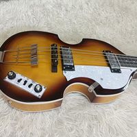 Guitare basse à quatre cordes de haute qualité avec manche en érable et touche en palissandre, très distinctive et élégante