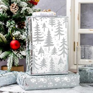 Papel de Regalo Navideño con Diseño de Copos de Nieve Plateados, Árboles de Navidad, Campanas, Dulces y Estrellas - Product Image 1
