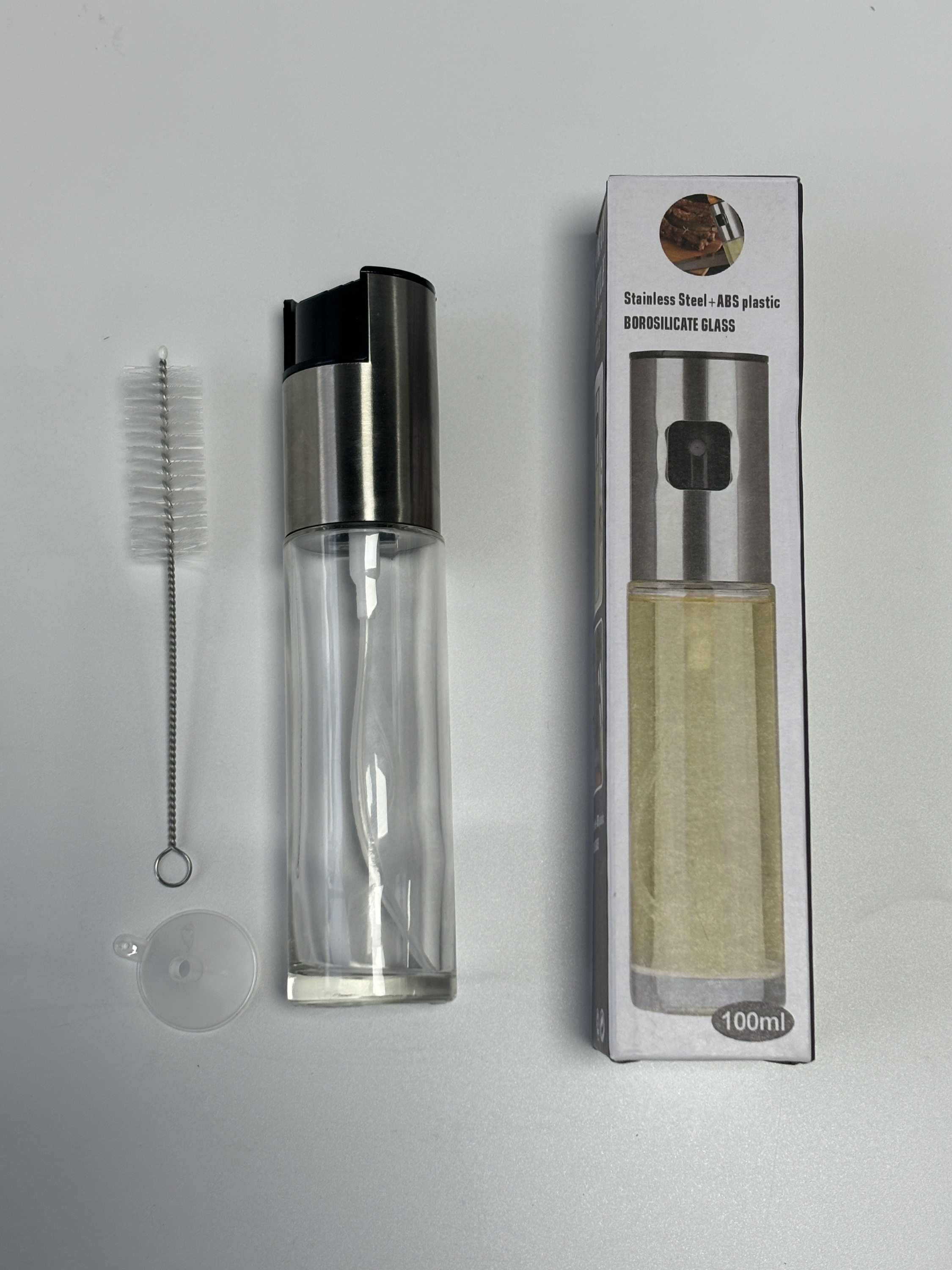 bouteille d'huile + entonnoir + pinceau