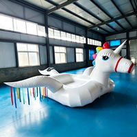 Bateau gonflable géant licorne tractable pour l'eau, capacité supérieure à 500 kg, idéal pour la plage, le lac et les parcs aquatiques