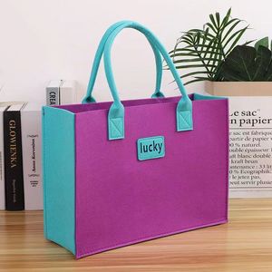 Produk wajib dimiliki untuk kegiatan promosi: desain gratis dengan gambar IP perusahaan bermotif pada tas tangan