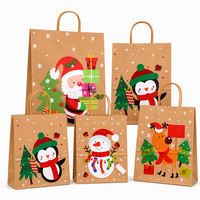Ensemble de sacs cadeaux en papier kraft imprimés avec des motifs de pinguins, de bonhommes de neige et de rennes de Noël, avec des poignées en corde torsadée