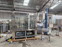 Machine de remplissage d'eau en bouteille, machine de remplissage de bouteilles PET pour eau minérale, machine de remplissage, de bouchage et d'étiquetage de bouteilles d'eau