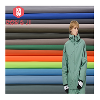 Nouveauté Tissu imperméable en polyester 100% 105-110 g/m² avec revêtement PU à mémoire de forme pour vestes de filles