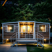 ZYBOX Casa Contenedor Expandible Elevada de 30 pies, Prefabricada, con Acabado en Madera Oscura, Villa Modular para Glamping y Retiro en el Bosque