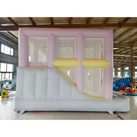 Château gonflable commercial en PVC pastel pour enfants, château sauteur macaron avec toboggan intégré pour location événementielle