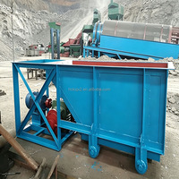 Alimentateur à chute robuste à mouvement alternatif pour le transport de minerai brut en morceaux grossiers