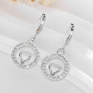 2025 nouveau 14K plaqué or cuivre Zircon-incrusté coeur creux boucles d'oreilles vêtements quotidiens bijoux en laiton pour les femmes - Product Image 1