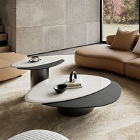 Ensemble de tables basses en marbre naturel de forme personnalisée, style minimaliste italien, avec structure en acier inoxydable, table créative d'inspiration mid-century