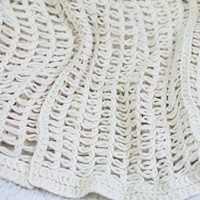 Ensemble deux pièces en crochet ajouré floral 3D pour femme, jupe midi, collection été 2026 – OEM/ODM – Ensembles tricotés au crochet pour femme