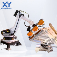 Système de pose de clous sur palettes en bois automatique robotisé à double station, haute efficacité, personnalisable, avec cellule robotique PLC servo-électrique