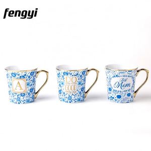 Tasses à café personnalisées en céramique bleue à fleurs, faites à la main, avec poignée dorée, pour maman - Product Image 2