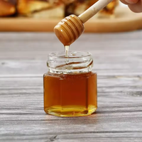 Fabricants Stock de Noël 1.5oz mini pot en verre pot de miel mini hexagones pot de miel en verre avec louche en bois