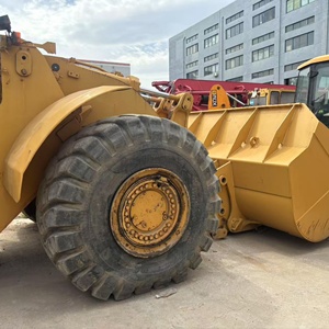 Cargadora de Ruedas Caterpillar 980G Modelo 2020, Capacidad de Carga Nominal de 45 Toneladas, Cabina Cerrada Amarilla, Neumáticos Todoterreno Grandes, Motor y Bomba - Product Image 3