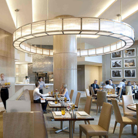 Lustre suspendu LED moderne en cristal à anneaux multiples de luxe, luminaire rond empilé pour la décoration intérieure d'hôtel