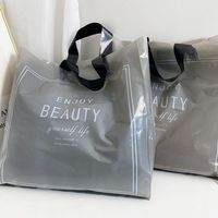 Sac à main en PE, emballage cadeau pour vêtements, sac à vêtements, sac d'emballage en plastique, sac de shopping cadeau