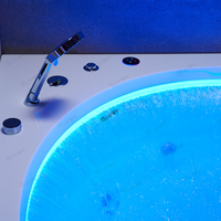 Baignoire de massage hydrothérapeutique haut de gamme et jacuzzi rond avec cascade et jets pour salle de bain d'angle