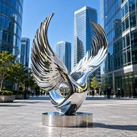 Escultura Cinética de Alas de Águila en Acero Inoxidable 3D Pulido Personalizado - Temas de Animales, Música, Amor y Cruz