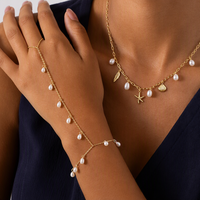 Parures de bijoux SA pour femmes : Collier, bracelet de main, perles simulées, breloques étoile de mer et coquillage, ton or, chic pour fête à la plage 2026