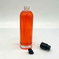 Vente en gros d'usine, flacon en verre transparent rond vide de 170 ml avec pompe à lotion en plastique noir pour sérum, tonique, lotion corporelle