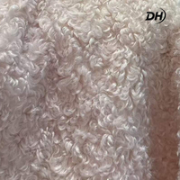 Tissu en peluche bouclé 100 % polyester, personnalisé, grand stock, moelleux et chaud, pour la production de vêtements d'hiver