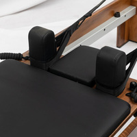 Appareil de Pilates Reformer de Luxe en Bois de Noyer pour Centres de Réadaptation, Centres de Bien-être et Studios