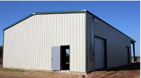 Atelier de construction en structure métallique personnalisée avec couleur et dimensions sur mesure