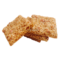 Machine à couper les barres de cacahuètes et de granola Moxin |   Ligne de production automatique de barres de céréales et de nougat