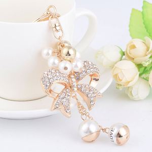 Creative Exquisite New Alloy Bow-shaped Keychain with Pearl String Full Diamonds Girls Car <b>Key</b> <b>Chain</b> for Mother's Day Gift - Product Image 4