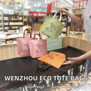 Sacs fourre-tout en tissu non tissé personnalisés avec impression, fabriqués au Vietnam, avec lettres, longues poignées, fermeture épaule en PP, écologiques, vente en gros - Product Image 2