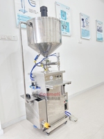 Machine de remplissage chauffée semi-automatique de bougie de cire de cheveux de crème solaire de liquide visqueux de pâte épaisse