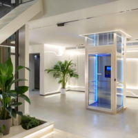 Ascenseur hydraulique résidentiel économique et personnalisé pour villa, sans gaine, avec cabine en verre panoramique en option pour résidence familiale
