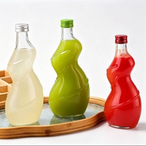 Nouvelles bouteilles de boisson en verre au design torsadé et courbé pour femmes, avec couvercle à vis en métal - Product Image 6