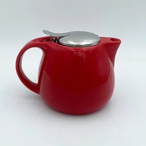 Juego de tetera china de cerámica roja nueva forma utensilios vela calefacción tetera de porcelana con infusor