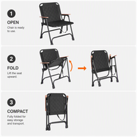 Chaise de camping noire durable avec structure en acier renforcé, tissu matelassé 600D, pliable à plat